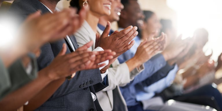 A round of applause at a conference event
