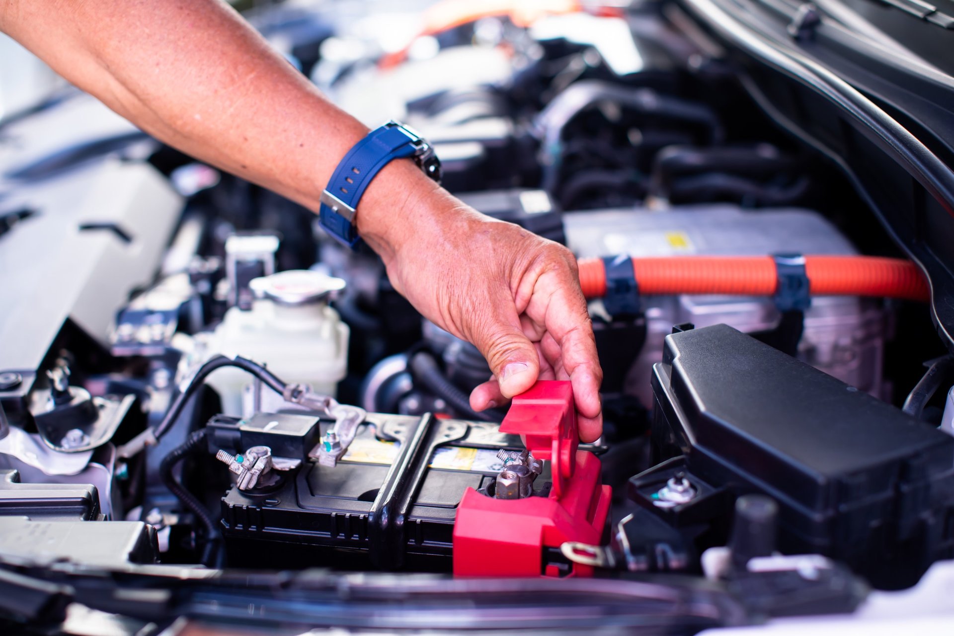 Technician working on electric vehicle
