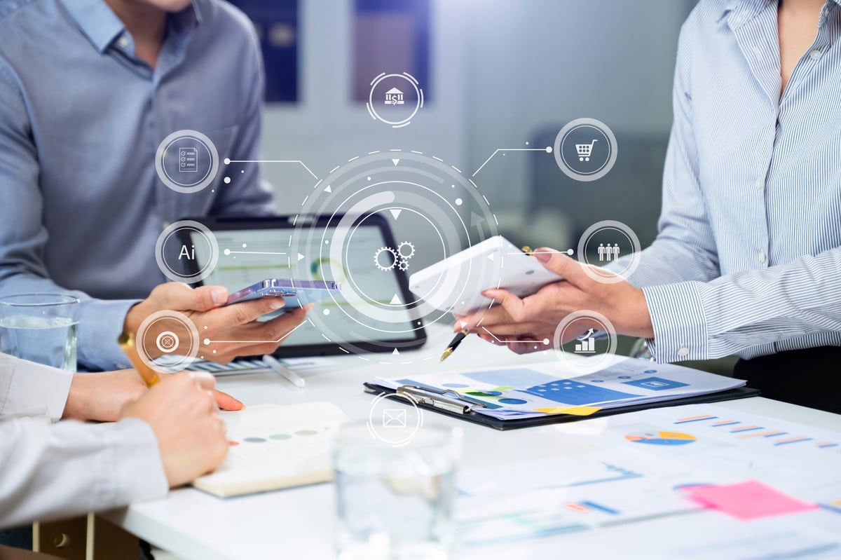 Working team meeting concept, business using laptop and smart phone and digital tablet computer with digital marketing media in virtual icon network diagram office in morning light